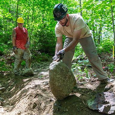 Workers fixing a trail